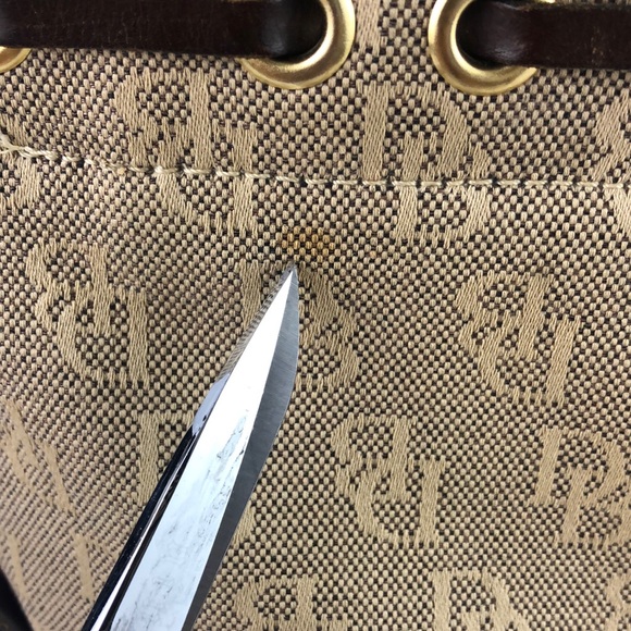 Dooney & Bourke Signature Logo Canvas/Leather Tassel Bag - Picture 6 of 16